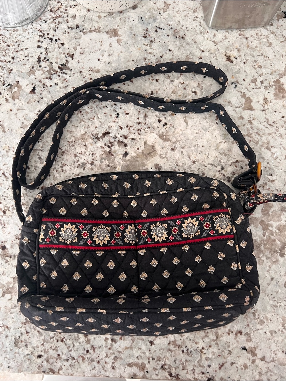 Quilted Black Crossbody Bag with Floral Trim